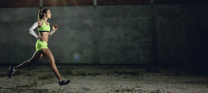 athlete running with arm overlay visualized