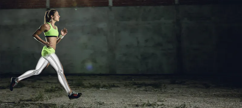 athlete running with leg overlay visualized