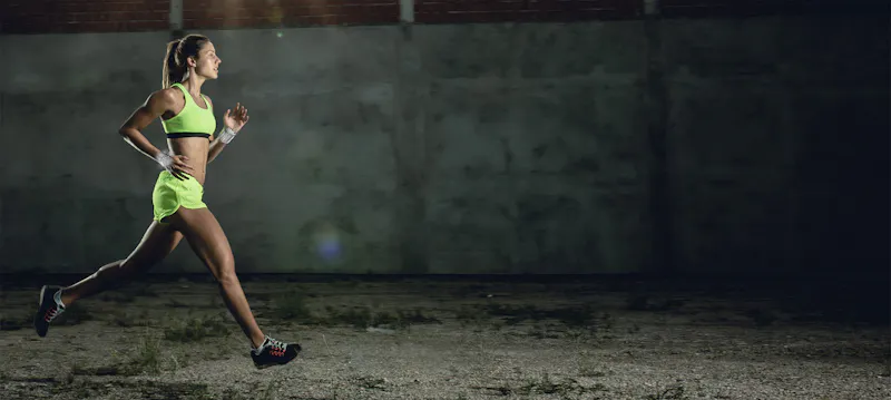 athlete running with wrist overlay visualized
