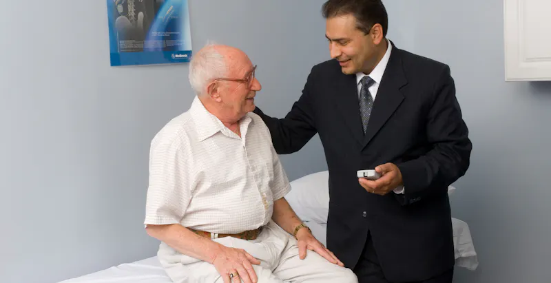 doctor talking to patient about their pain